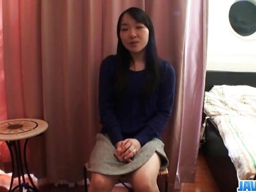 En asiatisk kvinde s ...
